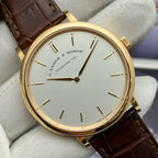A. Lange & Söhne Saxonia Ref. 211.032 with box no warranty card unworn stock protective film intact 40mm dial rose gold hand wound mechanical