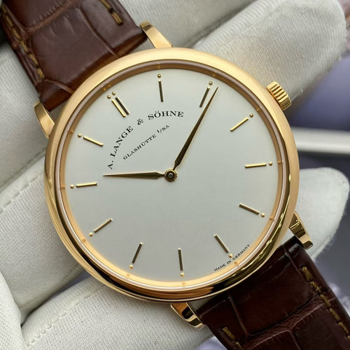 A. Lange & Söhne Saxonia Ref. 211.032 with box no warranty card unworn stock protective film intact 40mm dial rose gold hand wound mechanical