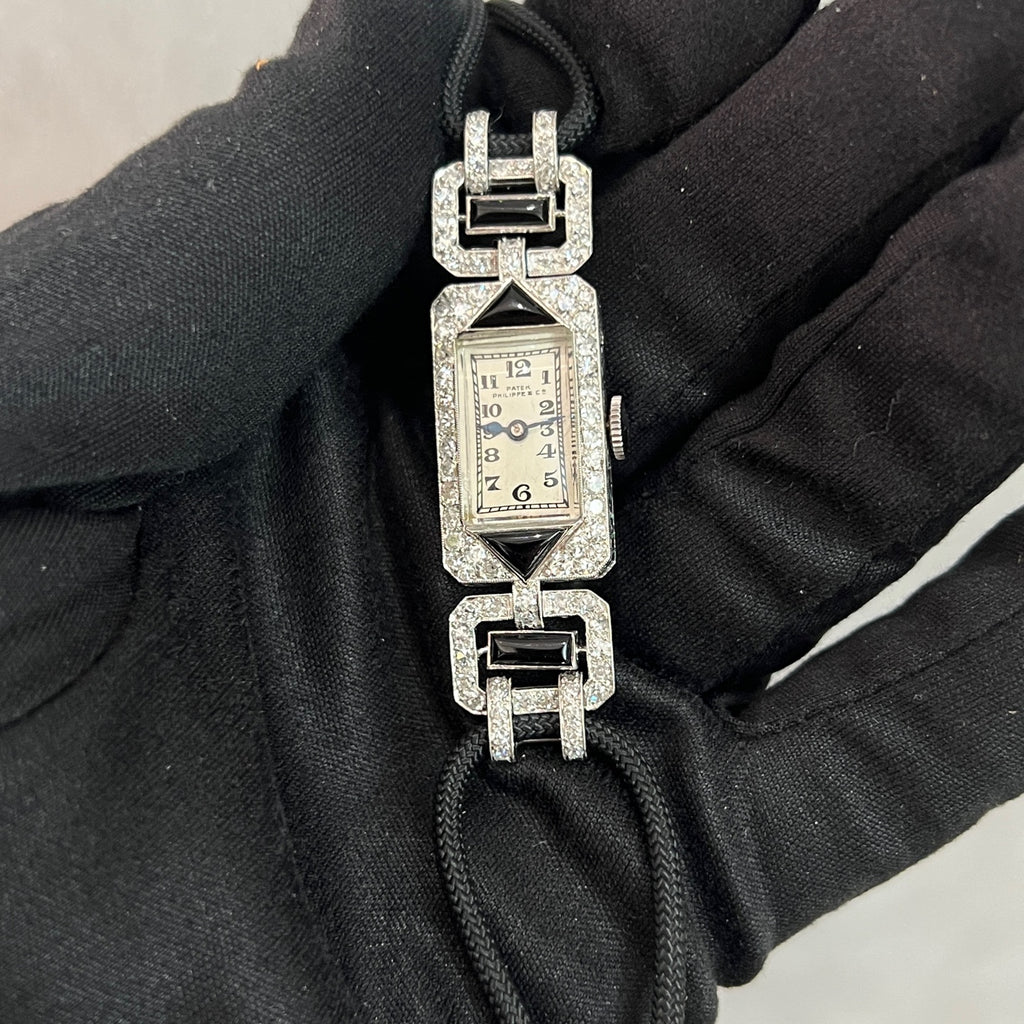 Early Patek Philippe Art Deco watch onyx dial engraved case sides