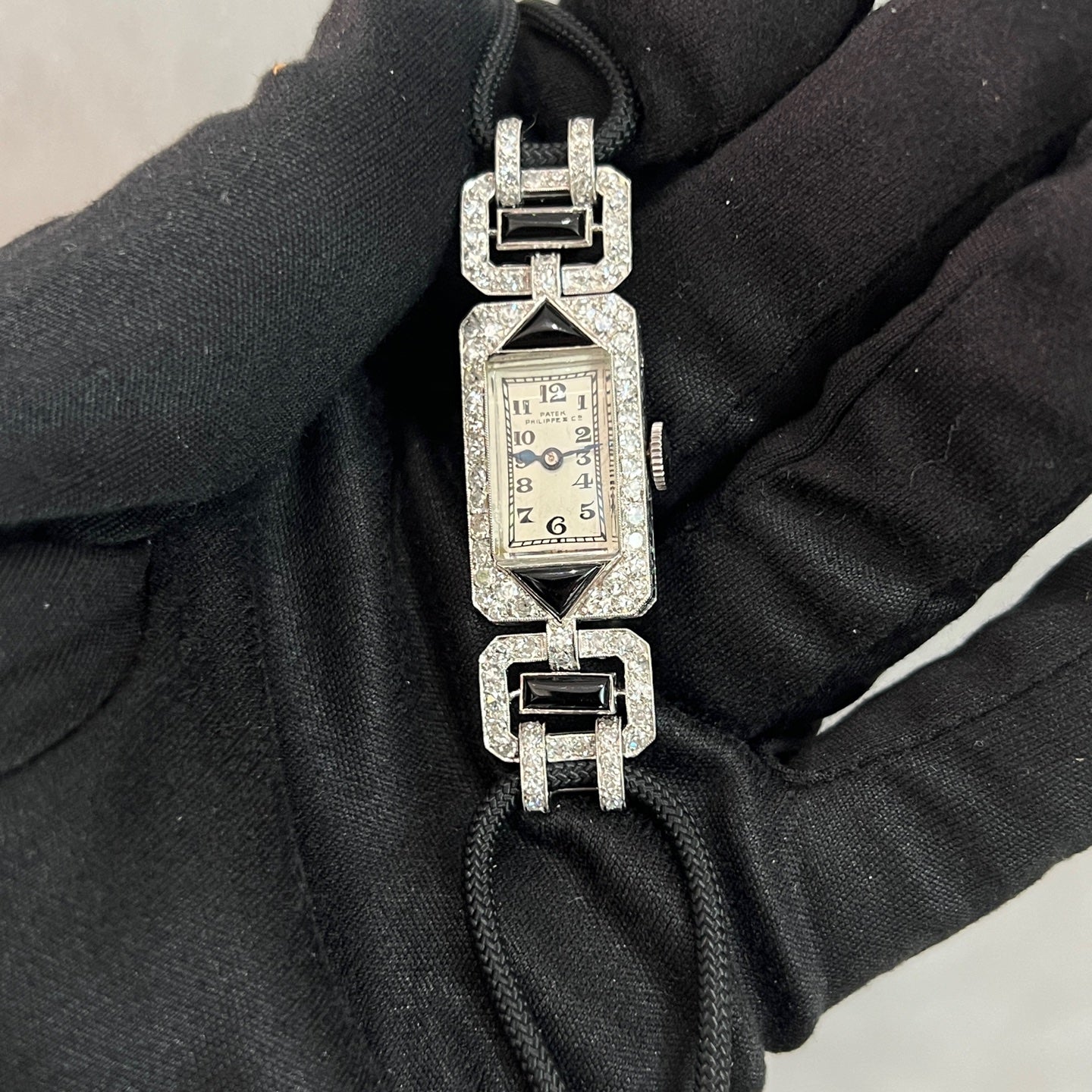 Early Patek Philippe Art Deco watch onyx dial engraved case sides