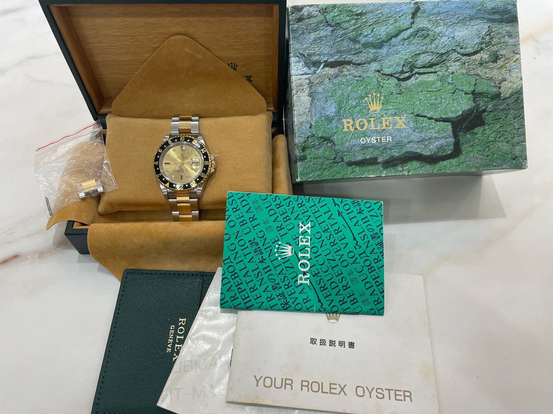 Rolex GMT-Master II 16713 automatic 40mm ruby diamond hour markers vintage watch full links box only no card