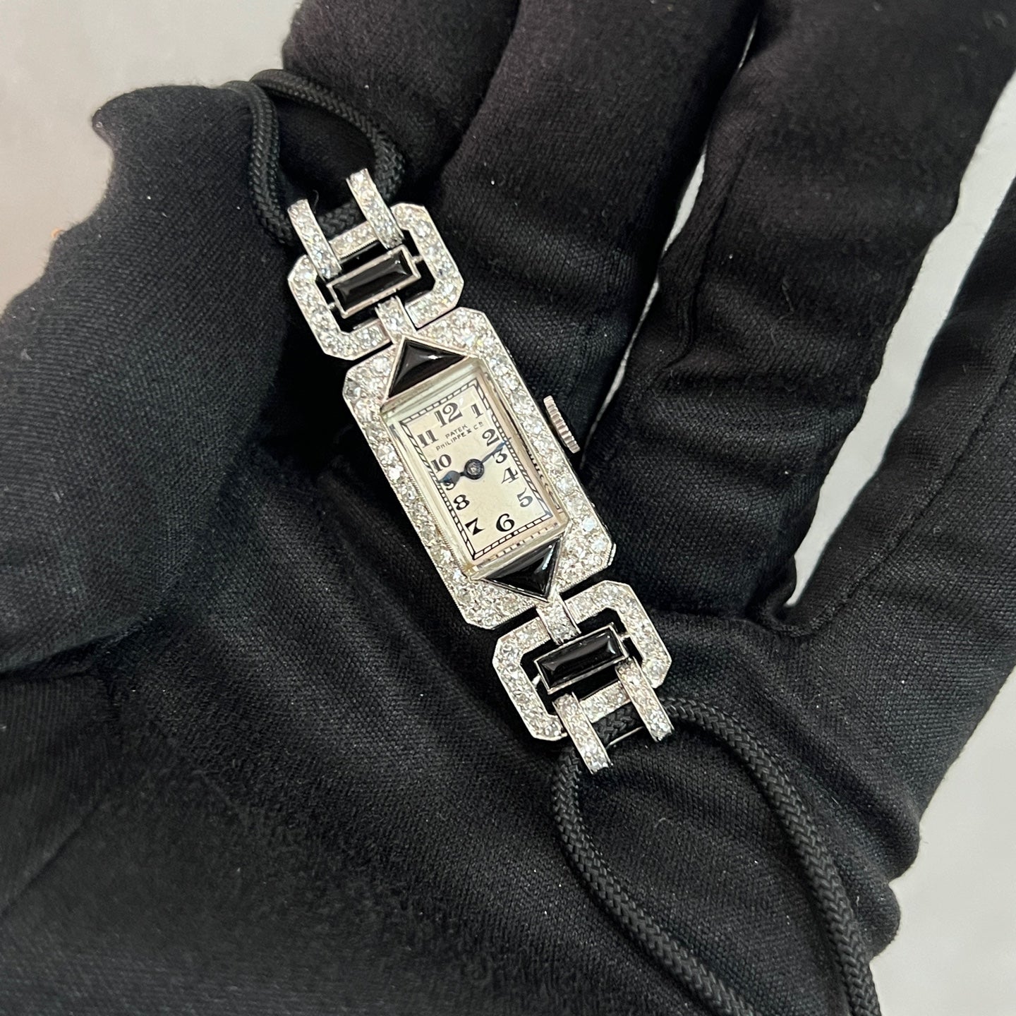 Early Patek Philippe Art Deco watch onyx dial engraved case sides